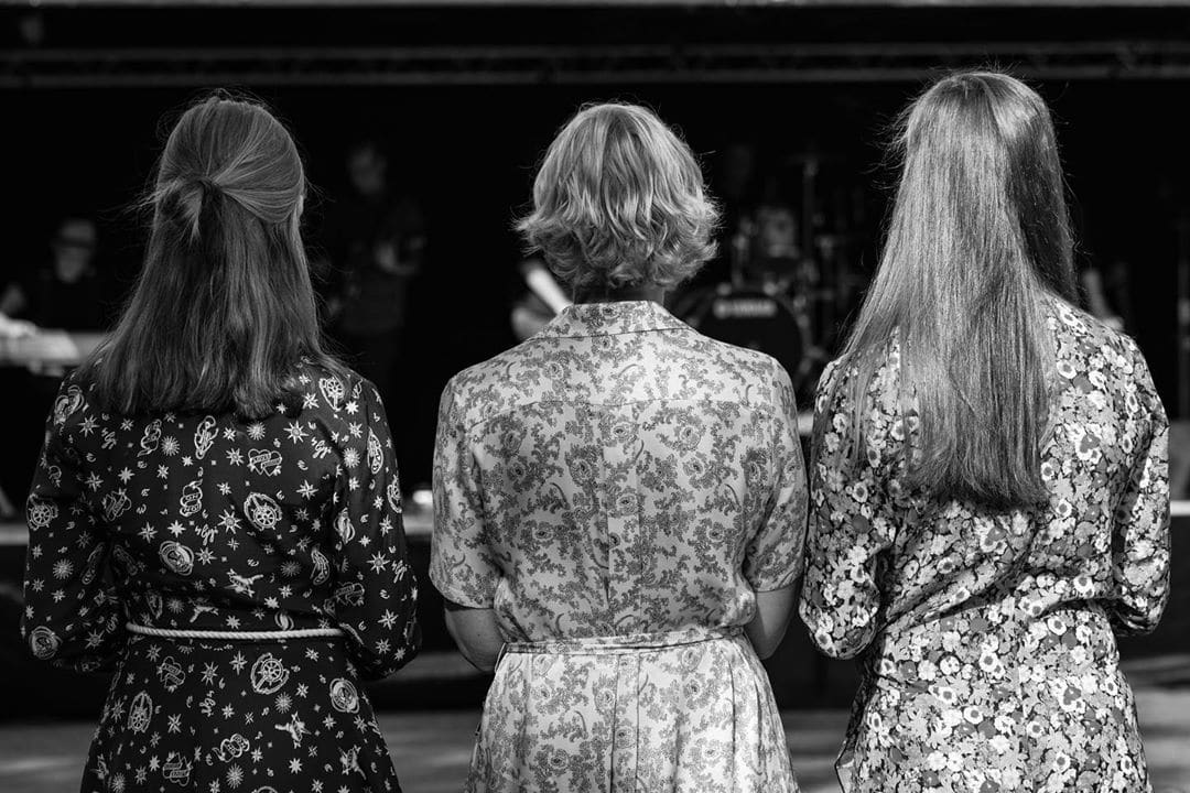 Standing strong with her two daughters